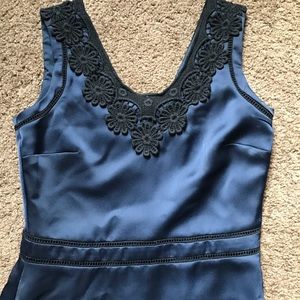 Satin dress with crochet detail